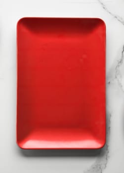 empty red plate on marble - recipe and restaurant mockup flatlay styled concept