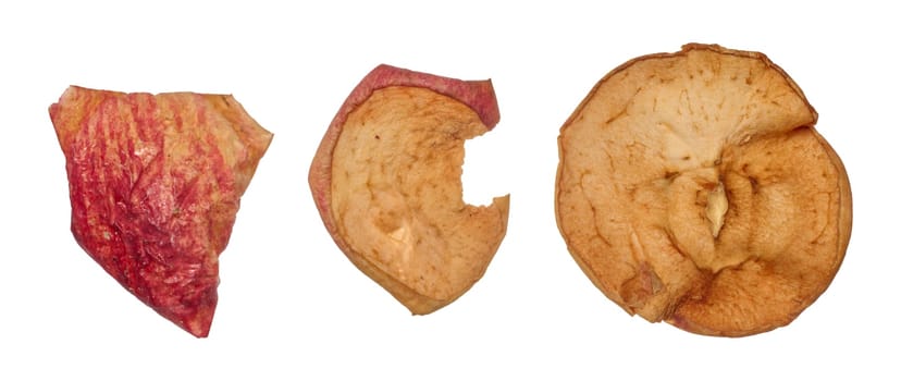 Dried apple slices on isolated background, top view