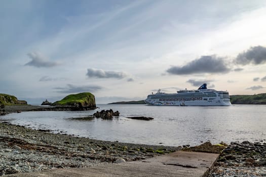 KILLYBEGS, IRELAND - MAY 16 2023: The Norwegian Star leaving after visiting Killybegs.