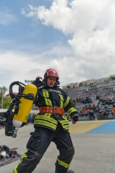 A firefighter dons the essential components of their professional gear, embodying resilience, commitment, and readiness as they gear up for a hazardous firefighting mission, a testament to their unwavering dedication to protecting and saving lives.