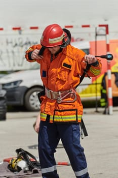 A firefighter, clad in professional gear, undergoes rigorous training to prepare for the hazards awaiting him on duty