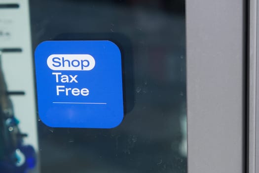 shop tax free text duty free shop sign on shop window ,