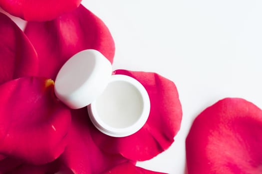 beauty cream jar and rose petals - cosmetics with flowers styled concept, elegant visuals