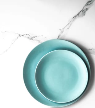 Turquoise empty plate on marble, flatlay - stylish tableware, table decor and food menu concept. Serve the perfect dish