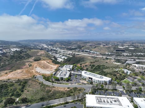 Aerial view of business park with mixed use facility service building and offices in South San Diego, California, USA