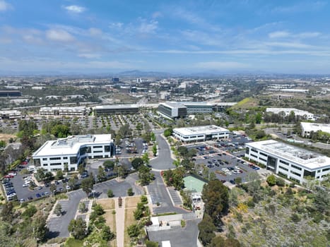 Aerial view of business park with mixed use facility service building and offices in South San Diego, California, USA