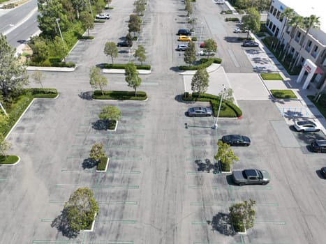 Open car parking lot viewed from above, aerial top view