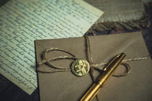 An antique envelope and a letter on the table. High quality photo