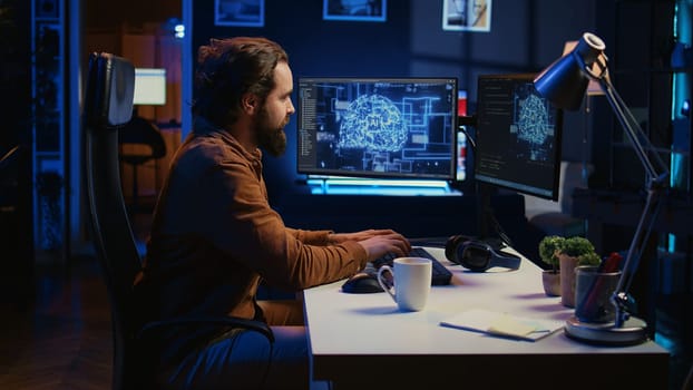 Computer scientist writes code on PC to visualize artificial intelligence neural networks. Remote IT worker runs AI script for information processing from personal office, camera B