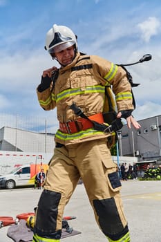 A firefighter dons the essential components of their professional gear, embodying resilience, commitment, and readiness as they gear up for a hazardous firefighting mission, a testament to their unwavering dedication to protecting and saving lives.