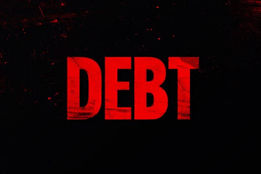 Debt text on black background . finance and investment concept.