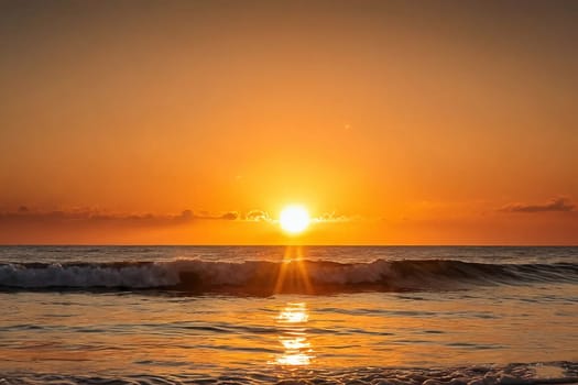 Hot summer sun over the sea. Sunset. High quality photo. Sunset over the water. Dawn. Sun over the ocean. Beach. Summer vacation