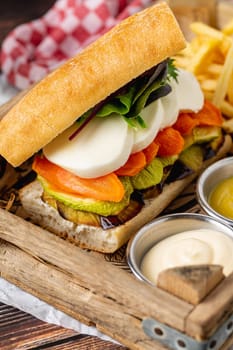 Vegetarian sandwich with mozzarella, zucchini, eggplant and carrots