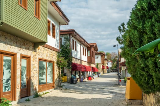 Restored houses with bay windows on the historical streets of Side Antalya