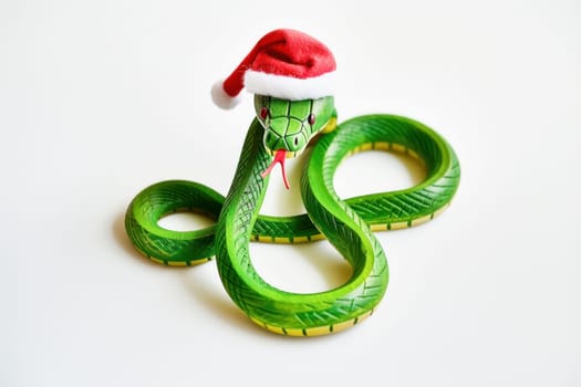 Picture a green snake donning a vibrant red Santa hat, a unique and festive image that captures the imagination