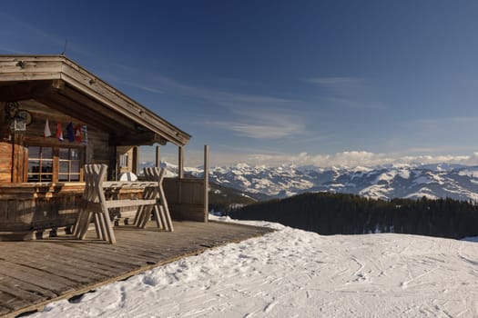 house in the mountains, alps in winter, ski resort