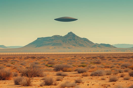 A photograph of a UFO hovering in the sky above a vast, barren desert landscape.