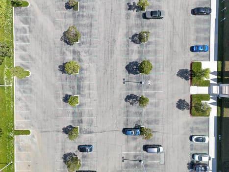 Open car parking lot viewed from above, aerial top view