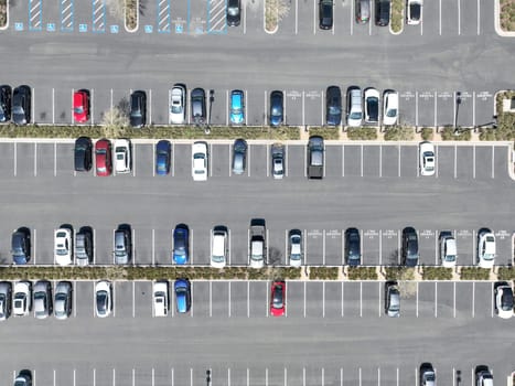 Open car parking lot viewed from above, aerial top view