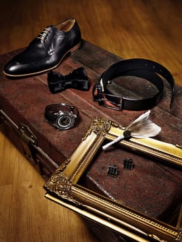 Men Accessories Shoe, wrist watch, tie, belt, cufflink, being photographed aesthetically for content creation and design ideas