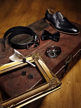 Men Accessories Shoe, wrist watch, tie, belt, cufflink, being photographed aesthetically for content creation and design ideas