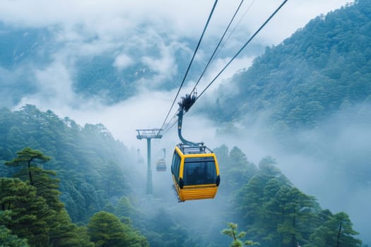 A yellow cable car is slowly moving through a misty forest beneath the overcast sky in the mountainous terrain
