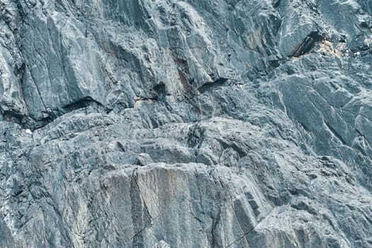 Texture rocks. Fragment of a granite wall.