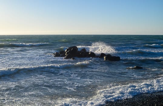 large stones in the Mediterranean sea near the beach