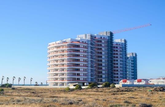 tower crane builds a residential complex near the Mediterranean Sea 4