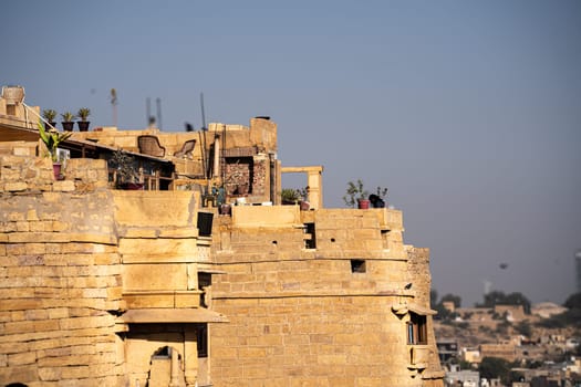 brown sandstone walls of the Jaisalmer Golden fort a popular tourist destination settled by rajput families in the state of Rajasthan India