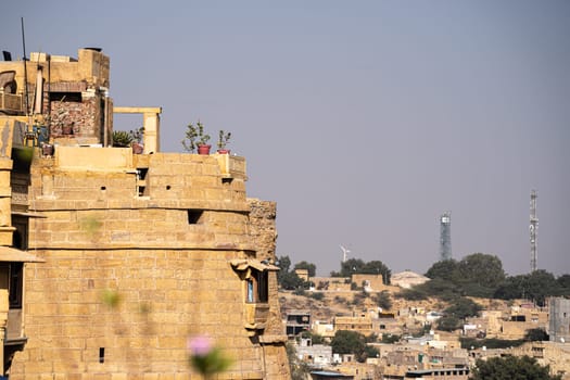 brown sandstone walls of the Jaisalmer Golden fort a popular tourist destination settled by rajput families in the state of Rajasthan India