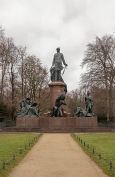 Berlin, Germany - Dec 20, 2023 - Bismarck Memorial (Bismarck Nationaldenkmal) a prominent memorial Bronze statue near the Berlin Victory Column's in the Tiergarten, is dedicated to, Minister President of the Kingdom of Prussia and Chancellor of the German Empire, Space for text, Selective focus.