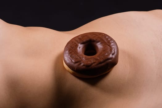 Close up young nice lady woman with slim body perfect skin nude top lingerie stand hold donut