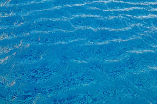 Swimming Pool Surface With Light Reflection and Water Ripple Patterns 1