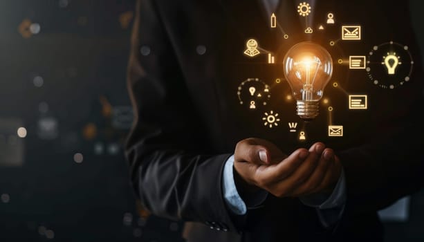 Businessman holding light bulb with digital glowing network, Concept of innovation and creativity by AI generated image.