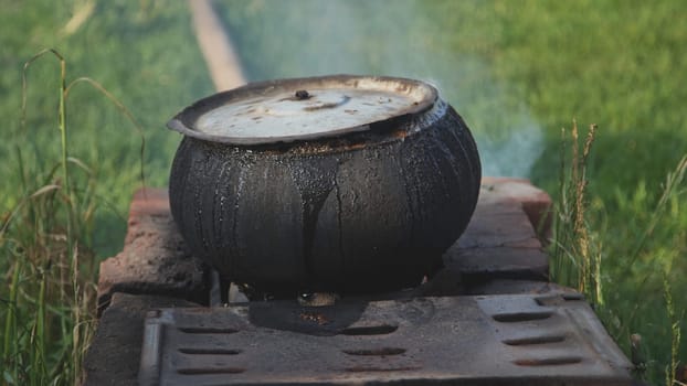 The cast iron in the village is used to cook food for the livestock