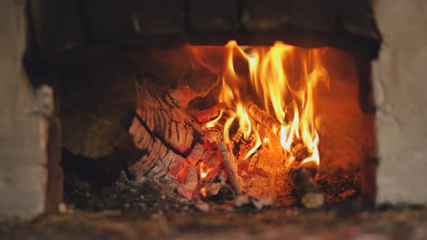 Burning fire in a Russian stove in the village