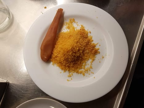 A partially grated mullet bottarga ready to season a dish.