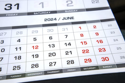 The page of the annual calendar for the month of June 2024. Resolution, strategy, decision, goal, business and holidays. Close-up.