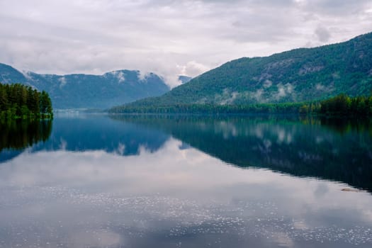 Araksfjorden Lake in Norway is, a beautiful mountain lake at sunrise