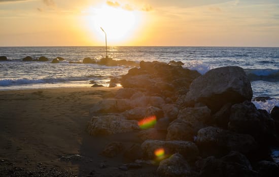 Sea landscape, sand beach and rocks on foreground. 3