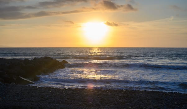 the sun sets into the sea on the Mediterranean coast on the island of Cyprus 1