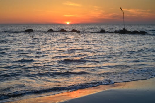 orange color of sunset on the Mediterranean coast on the island of Cyprus 2