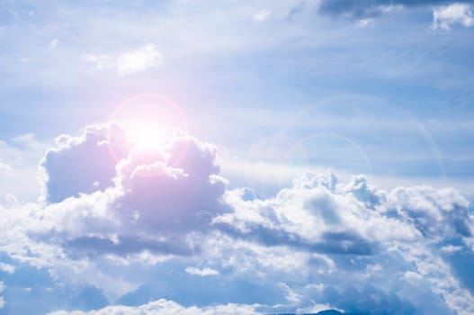 Beautiful cloud view with shining sun on blue sky. Nature concept.