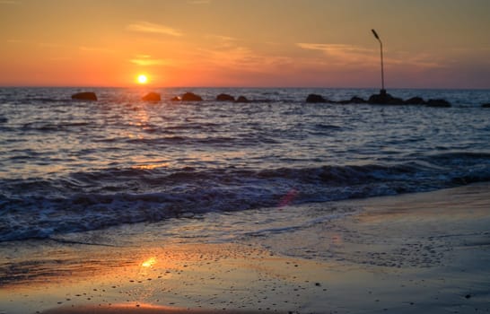 beautiful golden sunset on the Mediterranean coast on the island of Cyprus