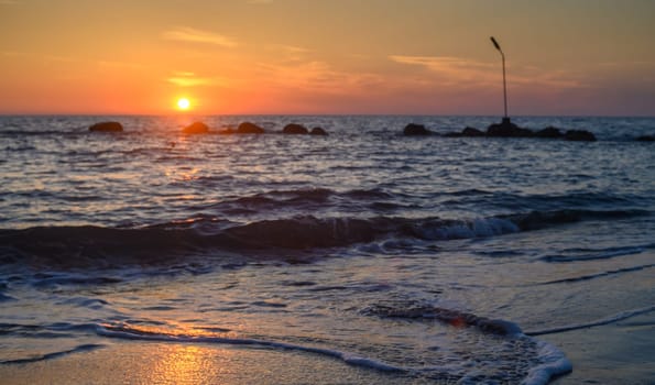 sea, clouds, mountains and waves on the Mediterranean coast on the island of Cyprus at sunset 2