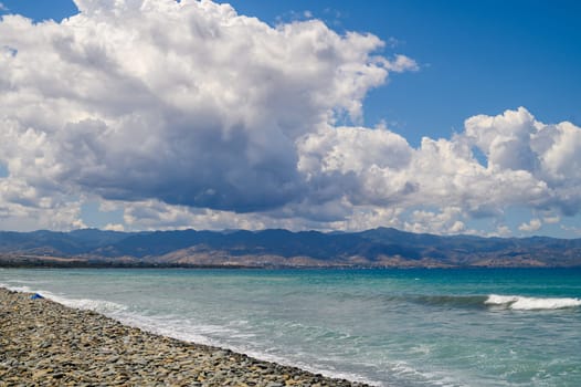 Mediterranean coast on the island of Cyprus on a sunny day, view of clouds and mountains 3