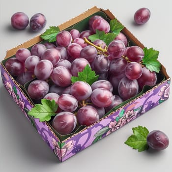 A close-up shot of a box filled with fresh red grapes, with a floral pattern on the outside.