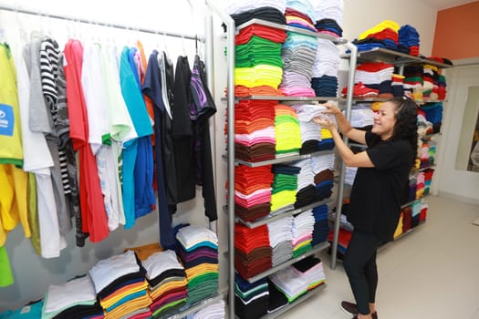 salvador, bahia, brazil - june 7, 2024: loja de venda roupas em uma junto a uma fábrica de costura na cidade de Salvador.