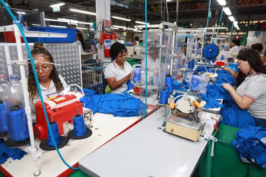 salvador, bahia, brazil - june 7, 2024: seamstress working in a textile factory in the city of Salvador.